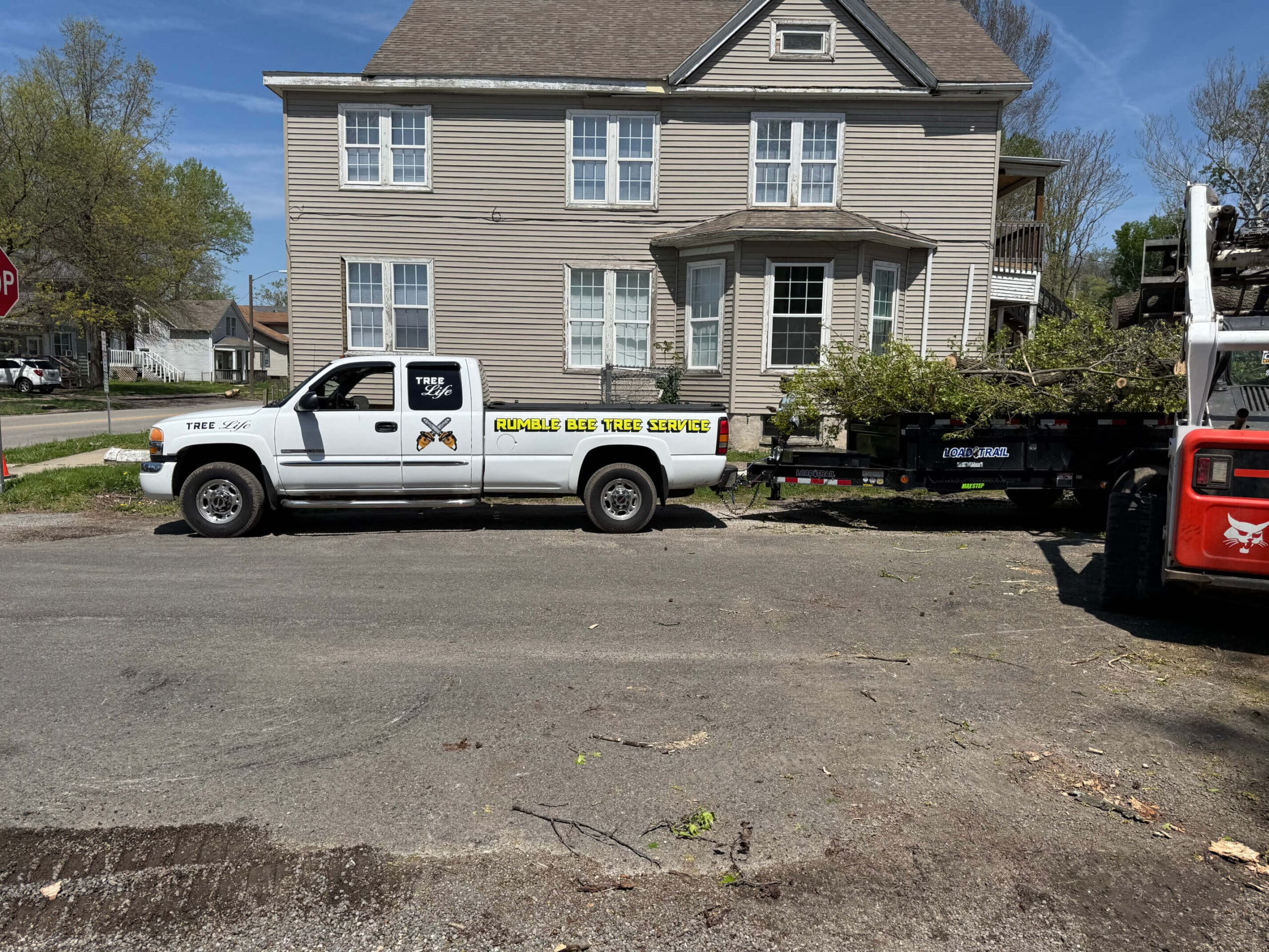 Rumble Bee Tree Service Truck Removing Debris
